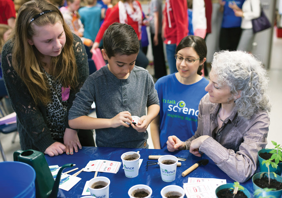 Dr. Bonnie Schmidt engaging with a group of students