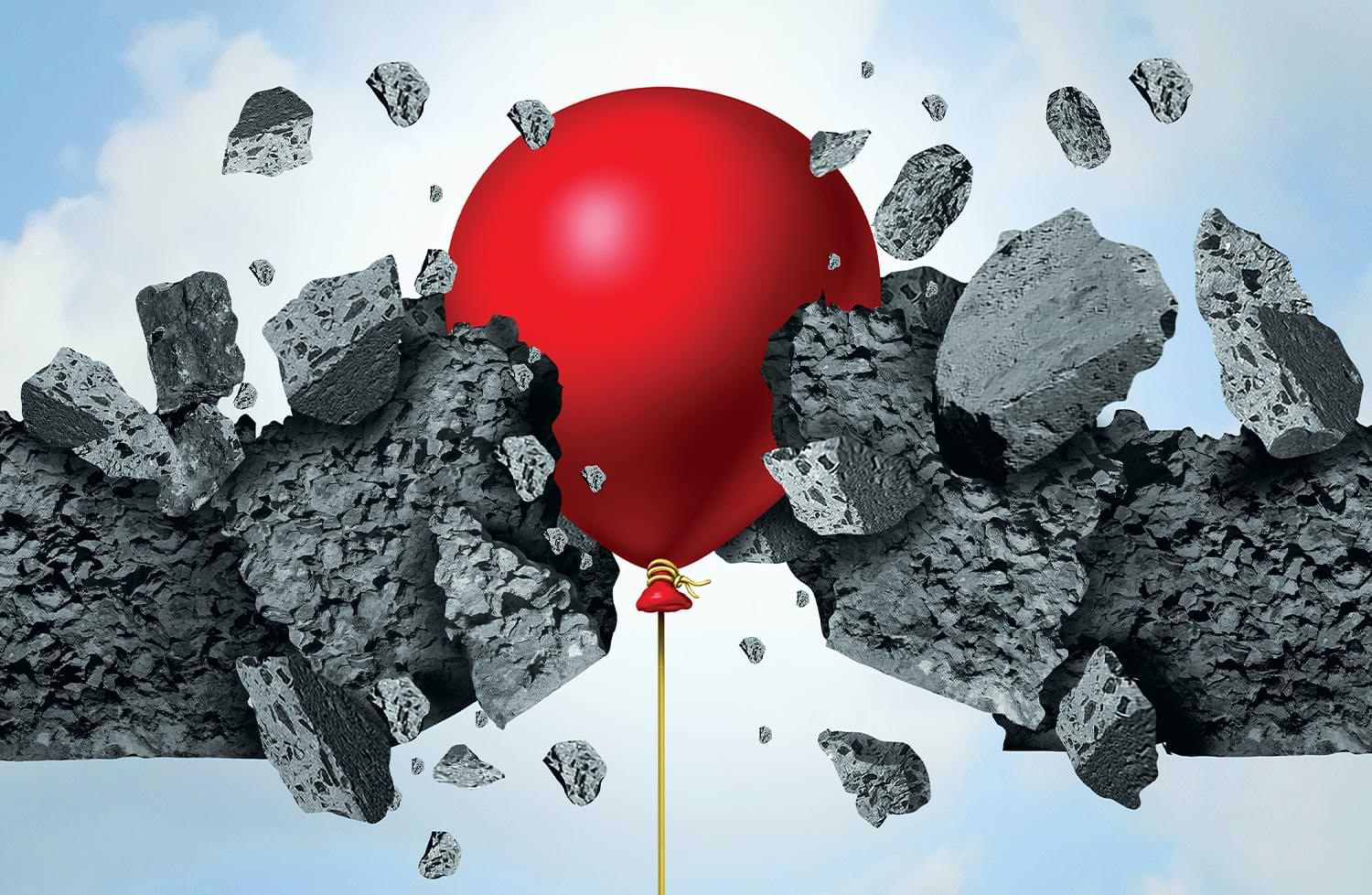 a bright red balloon floating up, breaking through a concrete